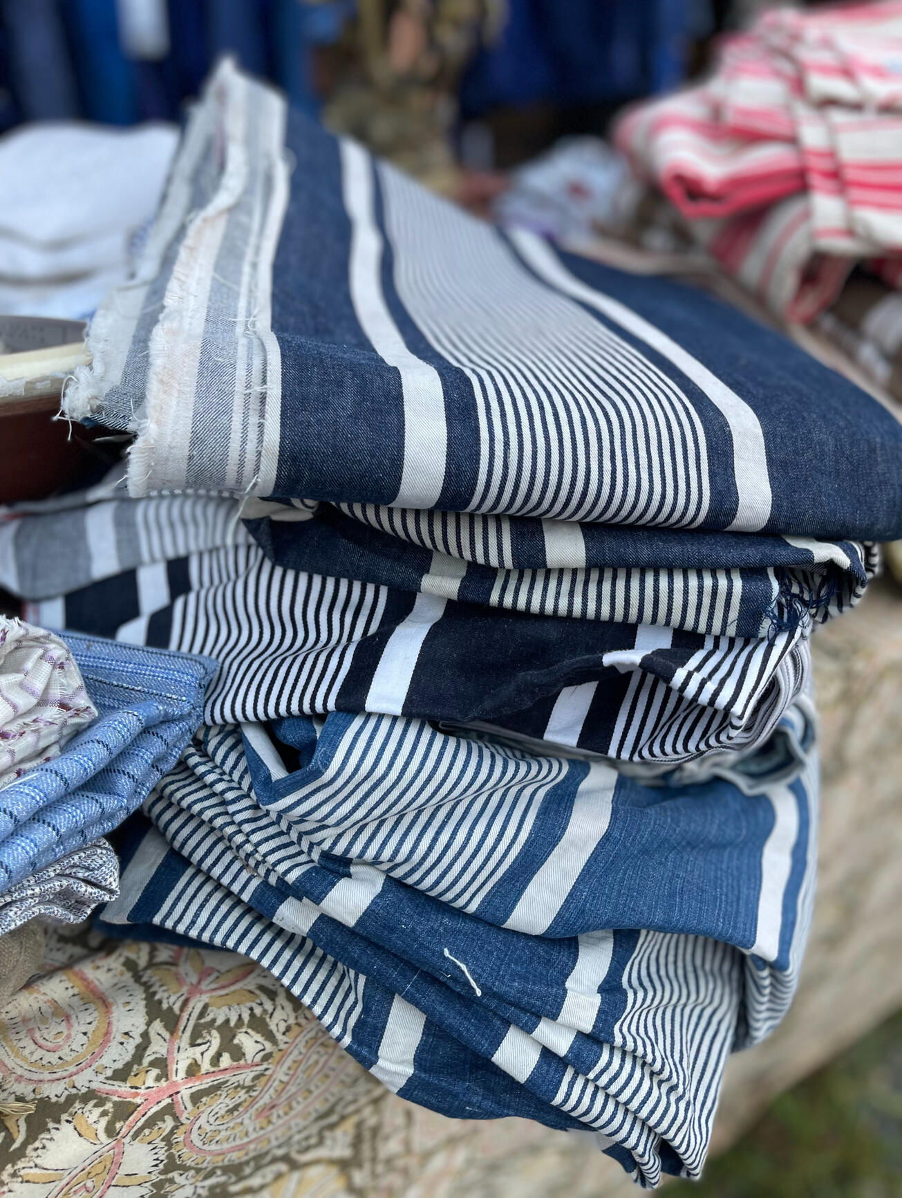 A photo of blue and white striped fabrics.